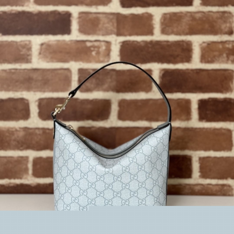 G*u*i top handle bags